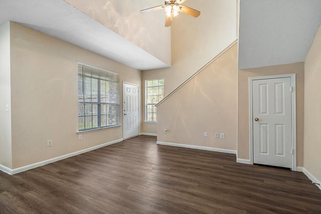 Living room with lighting at Fountains at Tidwell and The Enclave in Houston TX